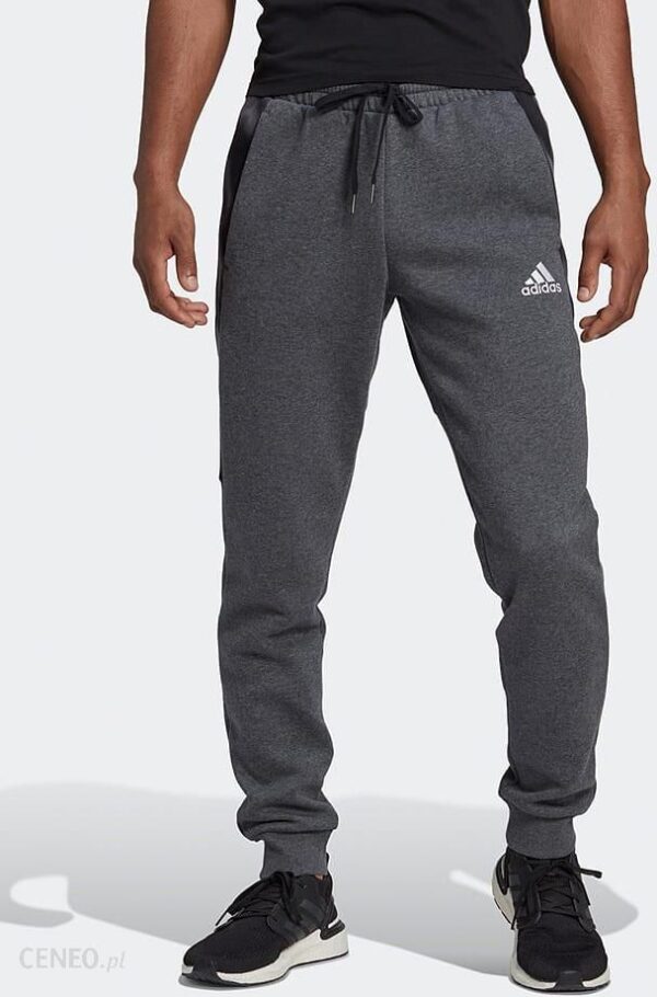 Adidas Spodnie dresowe "Camo PT" w kolorze szarym